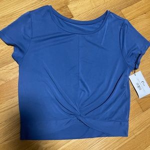 CALM BLUE SWIRL IN THE FRONT T